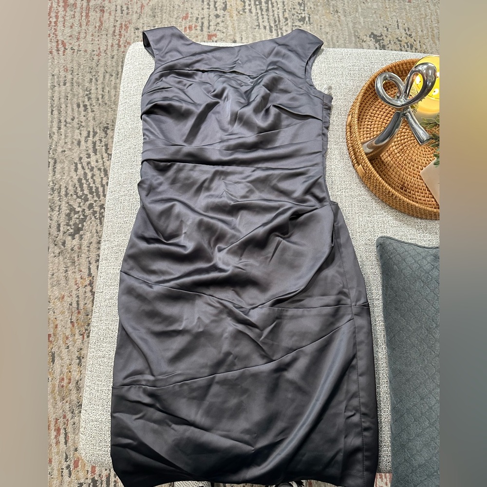 David’s bridal greyish with a hint of purple. Satin sheath dress